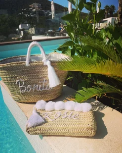 Bonita's Palm Leaf Clutch - Embroidered pom pom